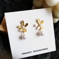 Korean Silver Needle New Elegant Daisy Earrings Same Pearl Flower Earrings Wholesale Nihaojewelry main image 4