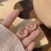 Korean Fashion Star Moon Pearl  Super Fairy  New Small Short Earrings Wholesale Nihaojewelry main image 3