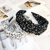 Korean Simple Wide-brimmed Letter Fold Headband High-end Retro Fabric Floral Headband Fashion Wholesale Nihaojewelry main image 4