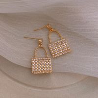 925 Silver Earrings Korean Pearl Bag Earrings New Senior Sense Earrings Wholesale Nihaojewelry sku image 1