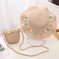 Children's Hats Girls Summer Shade Sunscreen Seaside Sun Hats Sweet Cute Crossbody Bag Colored Ball Lotus Leaf Straw Hat Wholesale Nihaojewelry main image 5