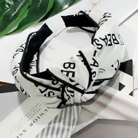 Korean Fashion Wide-brimmed Letter Printing Clip Knotted Headband High-end Wild Fashion Hairpin Temperament Hair Headband Ladies Wholesale Nihaojewelry main image 6