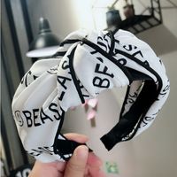 Korean Fashion Wide-brimmed Letter Printing Clip Knotted Headband High-end Wild Fashion Hairpin Temperament Hair Headband Ladies Wholesale Nihaojewelry sku image 2