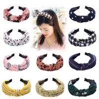 Wide-brimmed Fabric Knotted Hair Hoop Korean Simple Toothed Non-slip Hairpin Wild Wave Dot Hair Accessories Ladies Wholesale Nihaojewelry main image 1