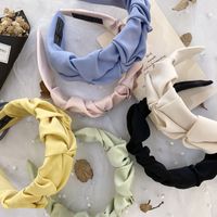 Korean Fold Headband Candy Solid Color Wide Edge Knotted Face Wash Headband Simple Hair Hole Head Band Wholesale Nihaojewelry main image 1