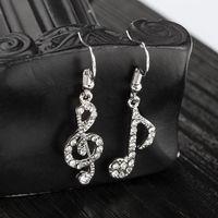 Moda Nueva En Forma De Diamante Notas Musicales Temperamento Pendientes Asimétricos Señoras Personalidad Salvaje Música Símbolo Pendientes Al Por Mayor Nihaojewelry main image 3