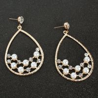 Creative Personality Drop-shaped Alloy Acrylic Diamond-set Pearl Earrings Wholesale Nihaojewelry main image 3