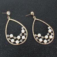 Creative Personality Drop-shaped Alloy Acrylic Diamond-set Pearl Earrings Wholesale Nihaojewelry main image 4