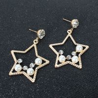 Fashion Temperament Imitation Pearl Alloy Star Wild Earrings Personality Exaggerated Earrings Wholesale Nihaojewelry main image 3