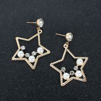 Fashion Temperament Imitation Pearl Alloy Star Wild Earrings Personality Exaggerated Earrings Wholesale Nihaojewelry main image 4