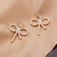 Hersteller Liefern Hohle Schleifen Silberne Nadel Ohrringe Kleine Perlen Elegante Schleifen Ohrringe Süße Ohrringe main image 5