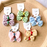 Korean  Children's Hair Rope Girl Candy Color Does Not Hurt The Hair Rubber Band Cute Plaid Bow Cheap  Hair  Scrunchies Nihaojewelry Wholesale main image 3