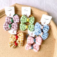 Korean  Children's Hair Rope Girl Candy Color Does Not Hurt The Hair Rubber Band Cute Plaid Bow Cheap  Hair  Scrunchies Nihaojewelry Wholesale main image 4