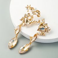 Exaggerated Golden Pearl Earrings Alloy Inlaid Glass Diamond Super Flash Long Earrings Wholesale Nihaojewelry main image 1