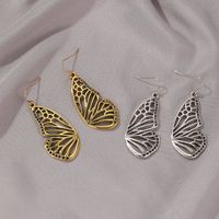 New Long Gold Butterfly Pendant Earrings Retro Hollow Half Butterfly Earrings Wholesale Nihaojewelry main image 4