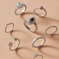 2020  Neue Legierung V-förmige Offene Drehung Ring 8-teiliges Set Glänzender Diamant Blumen Ring main image 3