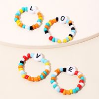 Hot Sale New Simple Color Rice Beads Love Ring Letter 4 Sets Of Ring Wholesale Nihaojewelry main image 2