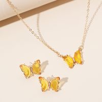 Simple New  Gold Simple Acrylic Diamond Sen Butterfly Pendant Earrings Necklace Clavicle Chain Set main image 1