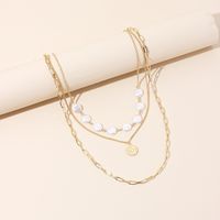 Women's Multi-layer Exquisite Pearl Necklace Simple And Fashionable Six-pointed Star Disc Necklace Sweater Chain main image 1