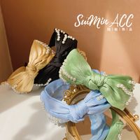 Korea's Pearl Bowknot Wide-brimmed Hairband Folds New Fashion Color Cloth Headband Hair Bundle Wholesale Nihaojewelry main image 6