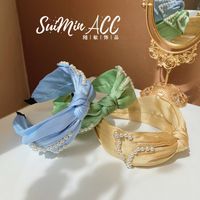 كوريا اللؤلؤ Bowknot واسعة الحواف هيرباند طيات جديد أزياء اللون القماش عقال الشعر حزمة الجملة Nihaojewelry main image 4