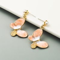 S925 Silver Needle Earrings Korean Alloy Drop Oil Inlaid Pearl Butterfly Earrings For Girl Fashion Heart Earrings main image 5