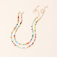 Fashion Retro Ethnic Style Necklace Simple And Sweet Love Letter Rice Beads Short Double Layer Necklace Wholesale Nihaojewelry main image 1