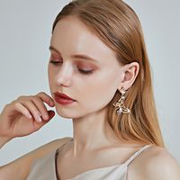 Fabrik Direkt Verkauf Europäischer Und Amerikanischer Neuer S925 Sterling Silber Ohrringe Ohrringe Großhandel Legierung Temperament Hohle Schmetterlings Ohrringe main image 1