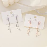 925 Silver Needle Korean Micro-inlaid Zircon Butterfly Tassel Long S-shaped Curve Earrings For Women main image 3