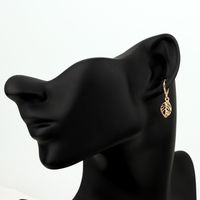 European Cross-border Sold Jewelry Retro Simple Hollow Leaves Circle Small Earrings Earclip Earrings Female  Hot main image 6