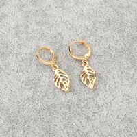 European Cross-border Sold Jewelry Retro Simple Hollow Leaves Circle Small Earrings Earclip Earrings Female  Hot sku image 1