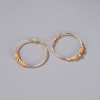 New Fashion Simple Geometric Hollow Circle Earrings Winding Beaded Earrings Wholesale Nihaojewelry main image 4