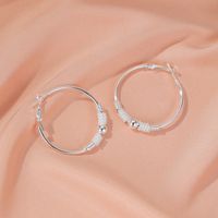 New Fashion Simple Geometric Hollow Circle Earrings Winding Beaded Earrings Wholesale Nihaojewelry main image 5