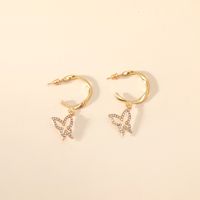 Korea Fashion Sweet Lady Hollow Butterfly Simple Age-reducing Geometric Twist C-shaped Alloy Earrings sku image 1