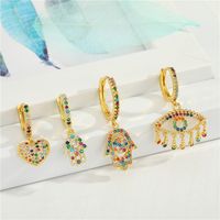 Fashion Micro-inlaid Love Color Zircon Palm Exquisite Diamond-set Eyes Tassel Small Copper Earrings main image 2