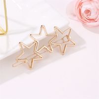 Korean Simple Hollow Five-pointed Star One Side Clip Three Stars Simple Metal Clip Wholesale main image 4