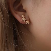 Fashion Frosted Three-star Five-pointed Star Alloy No Pierced Ear Clip Earrings main image 1