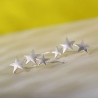 Fashion Frosted Three-star Five-pointed Star Alloy No Pierced Ear Clip Earrings main image 5