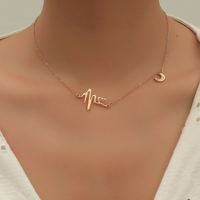 Fashion Niche Simple Retro Trend Alloy Hollow Heartbeat Moon Necklace main image 2