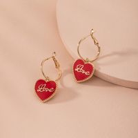 Mode Coréenne Lettre D'amour Rouge Doux Boucles D'oreilles En Alliage De Femmes Simples En Gros main image 1