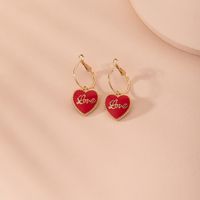 Mode Coréenne Lettre D'amour Rouge Doux Boucles D'oreilles En Alliage De Femmes Simples En Gros main image 4