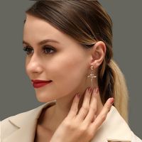 New Three-dimensional Embossed Rose Retro Elegant Cross Earrings Wholesale main image 6