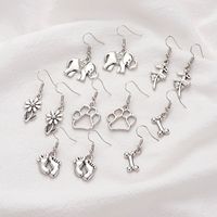 New Retro Alloy Footprint Ballet Bone Flower Earrings Wholesale main image 3