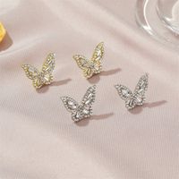 Neue Mode Einfache Zirkon Schmetterling Damen Wilde Kristalllegierung Ohrringe Großhandel main image 3