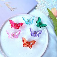Reine Farbe Schmetterling Mädchen Haarschnitt Mit Zähnen Pony Clip Großhandel main image 1