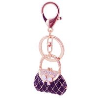 Korean Fashion Creative Diamond Handbag Bow Color Paint Keychain  Wholesale main image 3