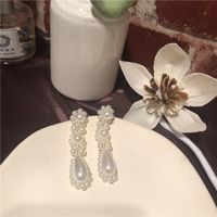 Show Style Ins Platzt Künstlich Hergestellte Wasser Tropfen Perlen Blumen Förmige Ohrringe Europäische Und Amerikanische Temperament Feen Ohrringe sku image 1
