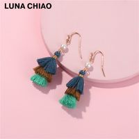 Qingdao Européen Et Américain Boucles D'oreilles Nouvelle Soie Arbre De Noël Coton De Gland Multi-couche De Couleur De Sucrerie Femmes De sku image 1