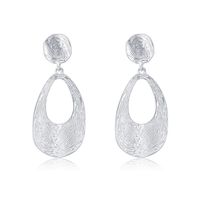 Exclusif Pour Croix-frontière Irrégulière Feuille De Métal Ronde Brossé Mat Argent Boucles D'oreilles De Femmes Européen Et Américain Moderne De Mode Boucles D'oreilles sku image 1