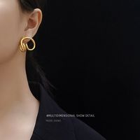 Special-shaped Cochlear Inspiration Steel Material Plated 18k Real Gold Earrings Wholesale main image 1